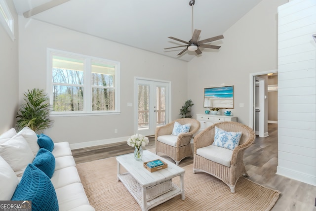 4660 Perry Rd, Gainesville, GA 30506 - living area with wood finished floors, a ceiling fan, and high vaulted ceiling