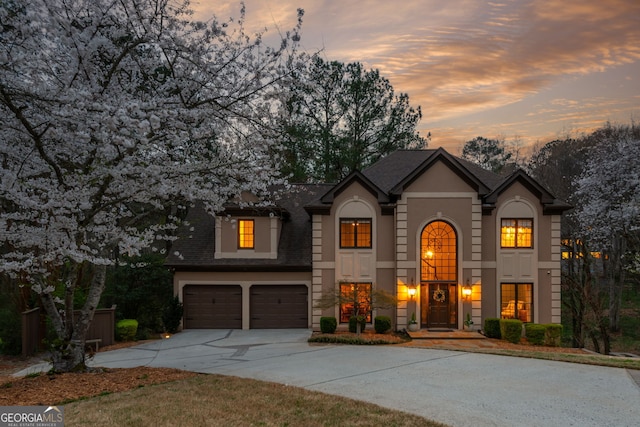 275 Tynebrae Pl, Roswell, GA 30075 - view of front of home with concrete driveway, stucco siding, and a garage