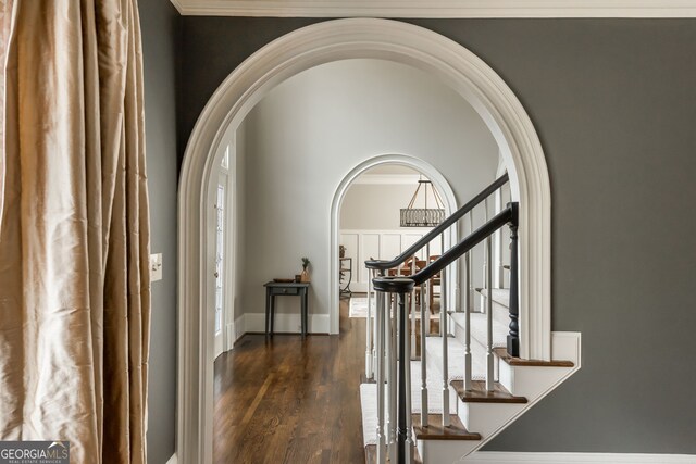 275 Tynebrae Pl, Roswell, GA 30075 - entryway featuring stairway, a high ceiling, arched walkways, and dark wood-style floors