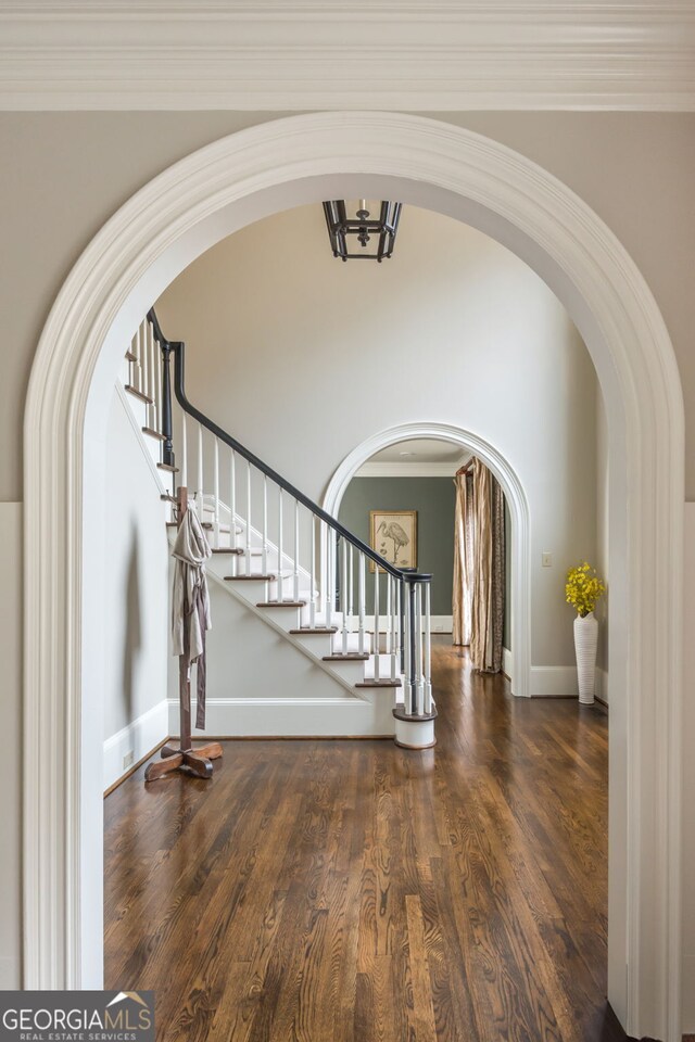 275 Tynebrae Pl, Roswell, GA 30075 - dining space with ornamental molding, a decorative wall, wainscoting, and dark wood-type flooring