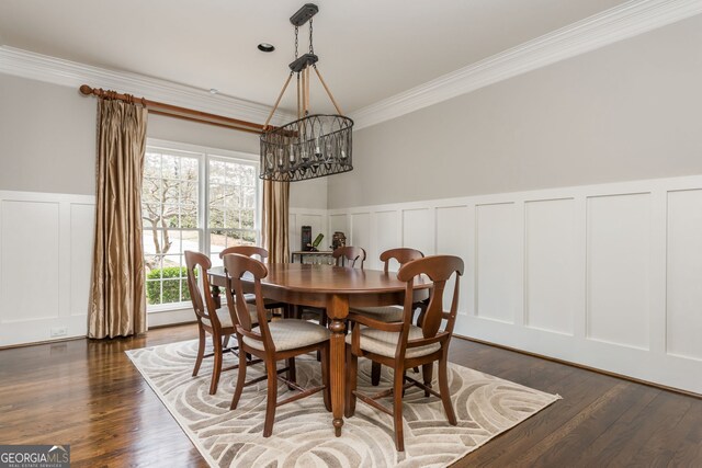 275 Tynebrae Pl, Roswell, GA 30075 - dining area with wainscoting, crown molding, a decorative wall, and dark wood finished floors