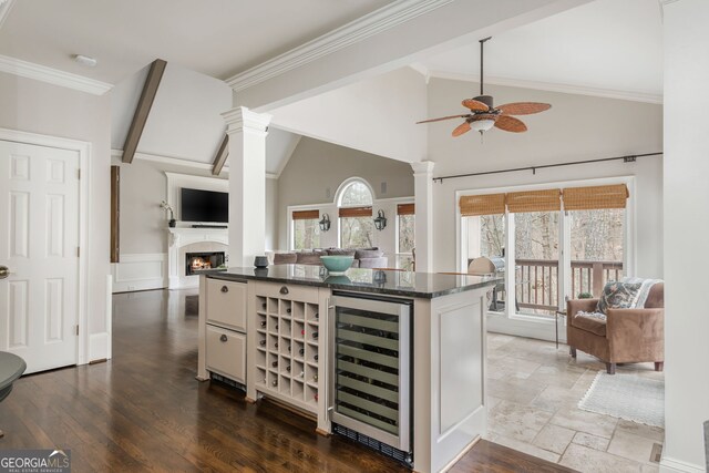 275 Tynebrae Pl, Roswell, GA 30075 - kitchen with beverage cooler, a sink, dark wood finished floors, appliances with stainless steel finishes, and decorative backsplash