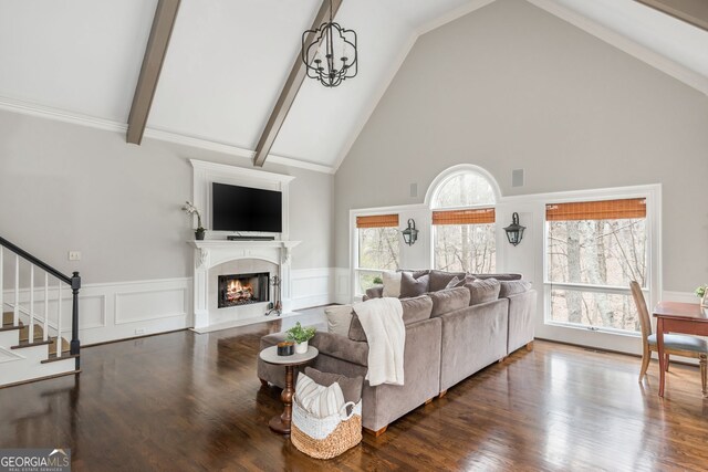 275 Tynebrae Pl, Roswell, GA 30075 - living room featuring visible vents, wainscoting, and high vaulted ceiling