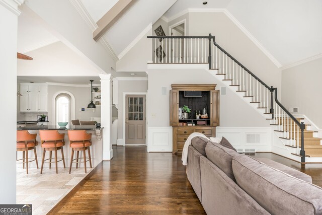 275 Tynebrae Pl, Roswell, GA 30075 - stairway with a tray ceiling, crown molding, a chandelier, and wood finished floors