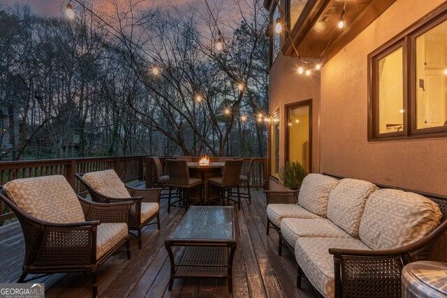 275 Tynebrae Pl, Roswell, GA 30075 - wooden deck with outdoor dining space and an outdoor living space with a fire pit