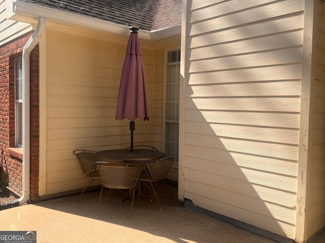198 Oakdale Rd SE, Cairo, GA 39828 - view of home's exterior with a shingled roof