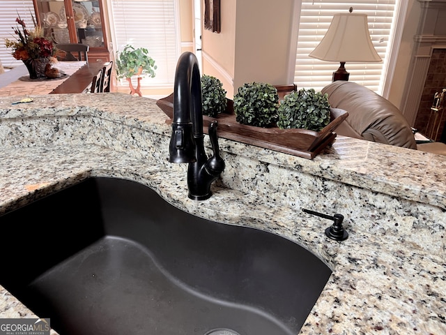 198 Oakdale Rd SE, Cairo, GA 39828 - room details with a sink and light stone countertops