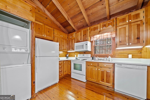 335 Misty Hollow Rd, Ellijay, GA 30536 - kitchen featuring white appliances, estacked washer and dryer, wooden ceiling, a sink, and light wood-style flooring