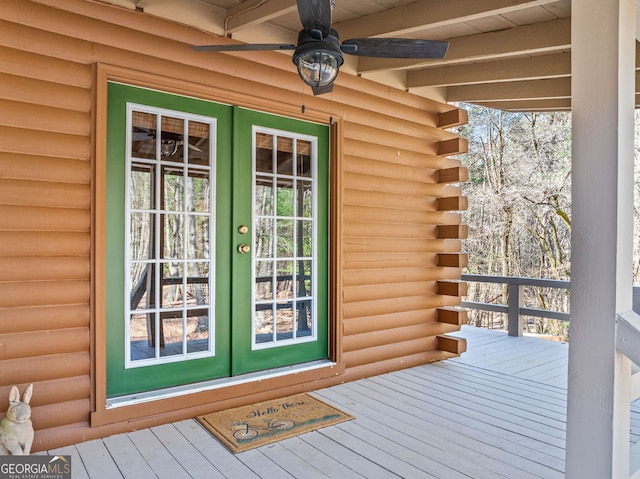 335 Misty Hollow Rd, Ellijay, GA 30536 - entrance to property with french doors, a deck, log siding, and a ceiling fan