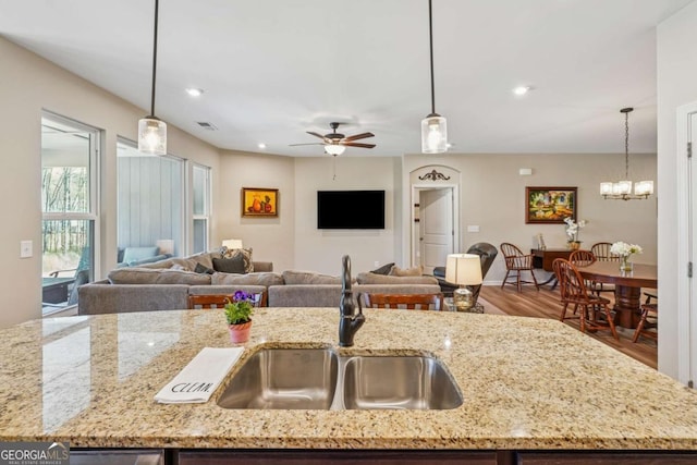67 Narrowleaf Ln, Dallas, GA 30157 - kitchen featuring open floor plan, a sink, pendant lighting, and visible vents