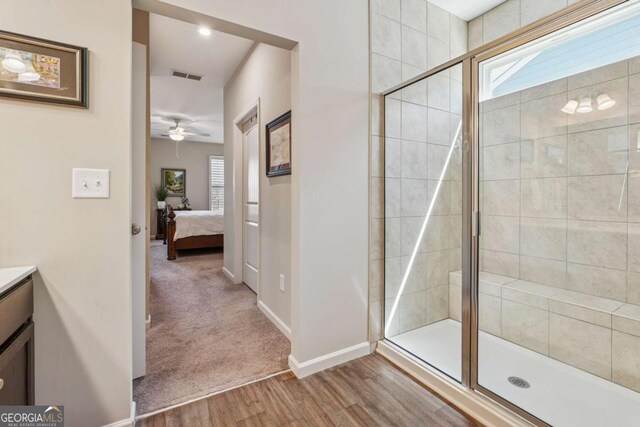 67 Narrowleaf Ln, Dallas, GA 30157 - ensuite bathroom featuring a shower stall, baseboards, visible vents, and ensuite bath
