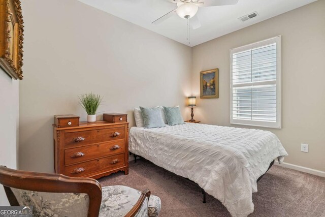 67 Narrowleaf Ln, Dallas, GA 30157 - carpeted bedroom with a ceiling fan, baseboards, and visible vents