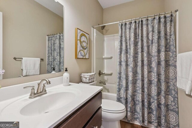 67 Narrowleaf Ln, Dallas, GA 30157 - bathroom with toilet, vanity, and shower / bath combo with shower curtain