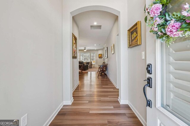 67 Narrowleaf Ln, Dallas, GA 30157 - entrance foyer featuring visible vents, baseboards, wood finished floors, recessed lighting, and arched walkways