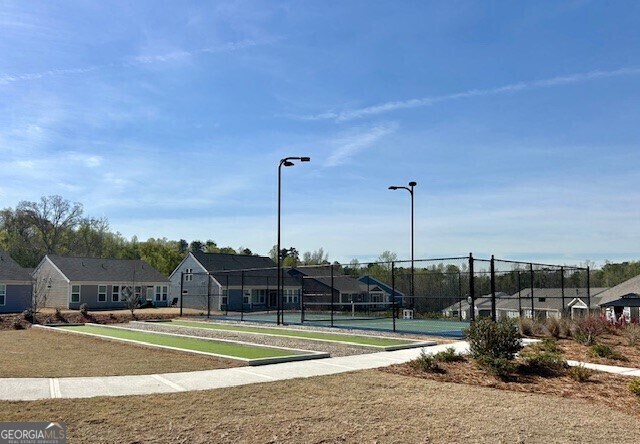 67 Narrowleaf Ln, Dallas, GA 30157 - view of home's community with a residential view, a tennis court, and fence