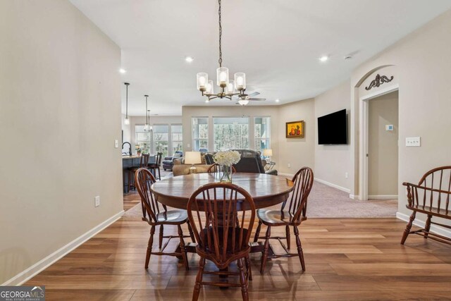 67 Narrowleaf Ln, Dallas, GA 30157 - dining area with baseboards, wood finished floors, an inviting chandelier, and recessed lighting