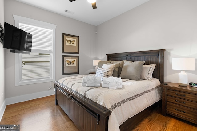 24 Harrison Ln, Blue Ridge, GA 30513 - bedroom with visible vents, light wood-type flooring, baseboards, and a ceiling fan
