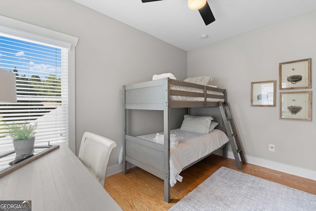24 Harrison Ln, Blue Ridge, GA 30513 - bedroom with baseboards, a ceiling fan, and wood finished floors
