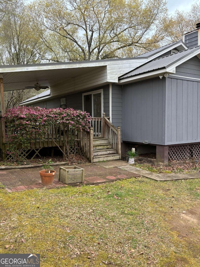 575 Lake Laurel Rd, Milledgeville, GA 31061 - doorway to property featuring a yard and a wooden deck