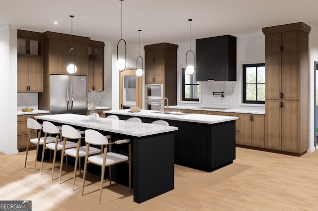 2650 Roswell Rd, Marietta, GA 30062 - kitchen featuring appliances with stainless steel finishes, a spacious island, backsplash, a sink, and recessed lighting