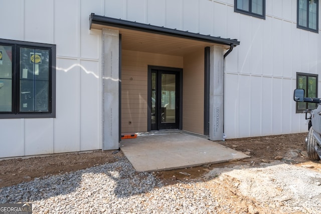 2650 Roswell Rd, Marietta, GA 30062 - view of exterior entry featuring board and batten siding and a patio area