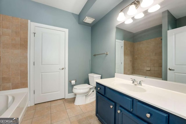 2230 Cheshire Bridge Rd NE Unit 410, Atlanta, GA 30324 - full bathroom with visible vents, toilet, tile patterned flooring, and vanity