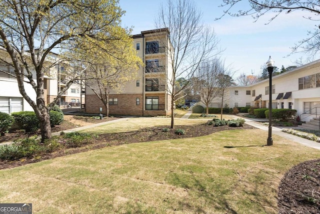 2230 Cheshire Bridge Rd NE Unit 410, Atlanta, GA 30324 - surrounding community with a lawn