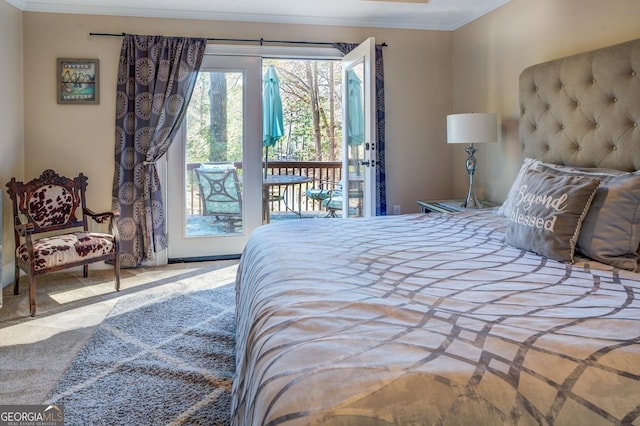 667 Cardinal Dr, Monticello, GA 31064 - carpeted bedroom featuring crown molding and access to outside