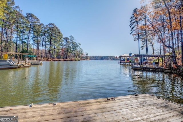 667 Cardinal Dr, Monticello, GA 31064 - view of dock featuring a water view