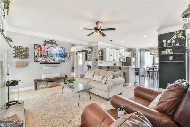 5753 Porch Swing Pl, Hoschton, GA 30548 - living area featuring ornamental molding, a ceiling fan, recessed lighting, and light carpet