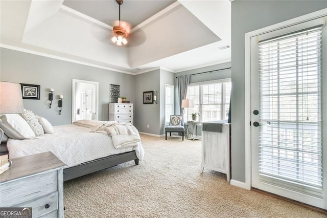 5753 Porch Swing Pl, Hoschton, GA 30548 - bedroom featuring a raised ceiling, light carpet, access to exterior, ornamental molding, and ceiling fan