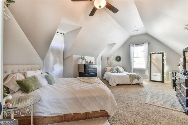 5753 Porch Swing Pl, Hoschton, GA 30548 - carpeted bedroom with vaulted ceiling and a ceiling fan