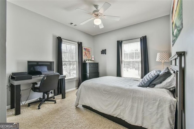 5753 Porch Swing Pl, Hoschton, GA 30548 - bedroom with carpet floors, baseboards, and ceiling fan
