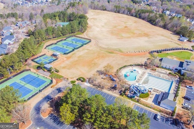 5753 Porch Swing Pl, Hoschton, GA 30548 - aerial overview of property's location with a pool area