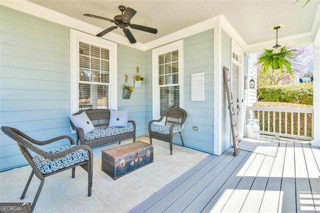 5753 Porch Swing Pl, Hoschton, GA 30548 - wooden porch with a ceiling fan