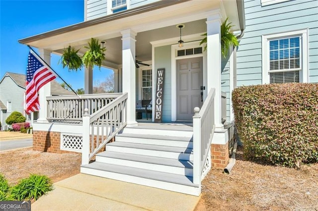 5753 Porch Swing Pl, Hoschton, GA 30548 - property entrance featuring a porch