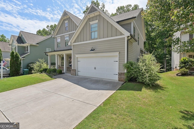 557 Winder Trl, Canton, GA 30114 - craftsman inspired home featuring board and batten siding, concrete driveway, a garage, and a front lawn