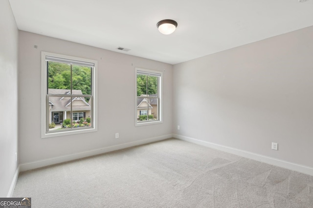 557 Winder Trl, Canton, GA 30114 - unfurnished room featuring carpet floors