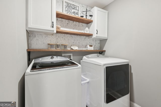 557 Winder Trl, Canton, GA 30114 - washroom featuring separate washer and dryer and cabinet space