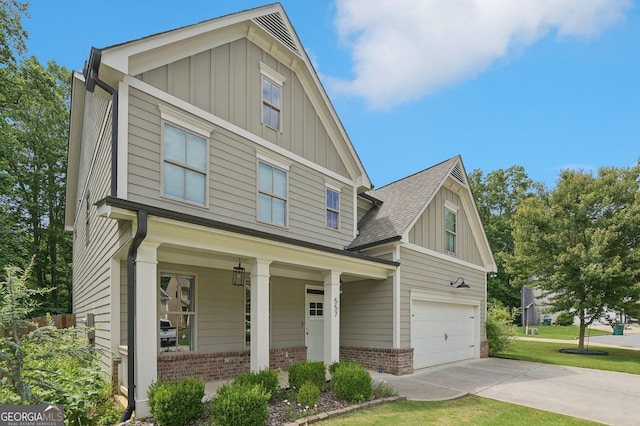 557 Winder Trl, Canton, GA 30114 - craftsman inspired home with board and batten siding, brick siding, and covered porch