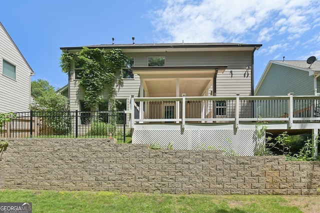 557 Winder Trl, Canton, GA 30114 - back of property with a deck