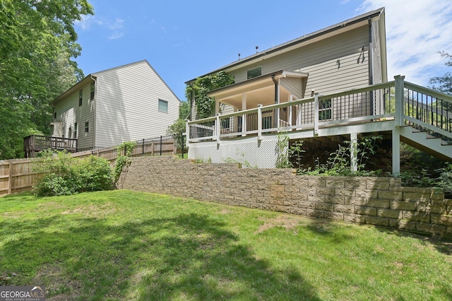 557 Winder Trl, Canton, GA 30114 - rear view of property with a wooden deck and stairway