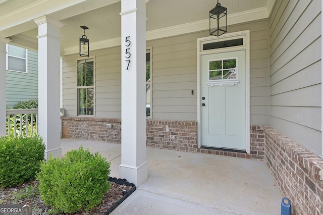 557 Winder Trl, Canton, GA 30114 - entrance to property with a porch and brick siding