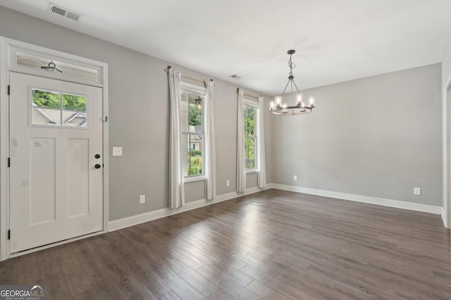 557 Winder Trl, Canton, GA 30114 - foyer entrance with a chandelier, healthy amount of natural light, and dark wood finished floors