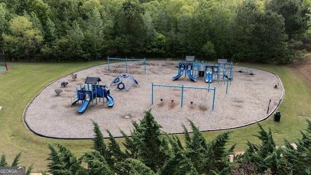 557 Winder Trl, Canton, GA 30114 - communal playground featuring a lawn and a forest view