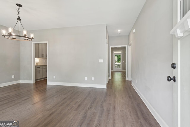 557 Winder Trl, Canton, GA 30114 - spare room with a chandelier, dark wood-style flooring, and recessed lighting