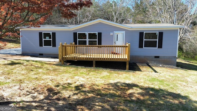 247 Hidden Valley Dr, Alto, GA 30510 - rear view of house with crawl space, a deck, and a lawn
