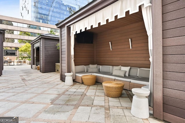 view of patio with a pergola and an outdoor living space