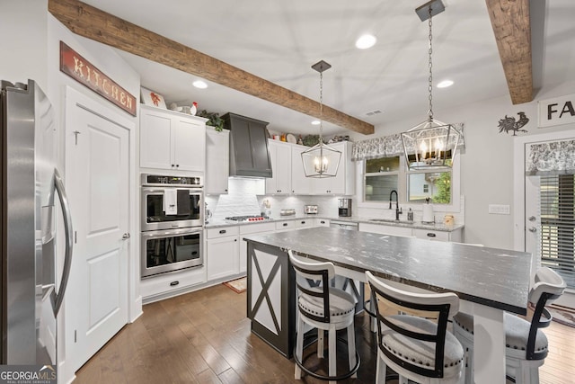 4030 Amberhill Cir, Cumming, GA 30040 - kitchen with tasteful backsplash, custom range hood, a sink, appliances with stainless steel finishes, and beam ceiling