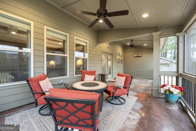 view of patio featuring ceiling fan